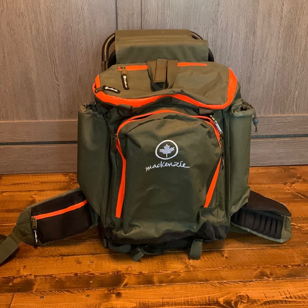 Mackenzie hunting backpack with built in chair stool bag outdoors